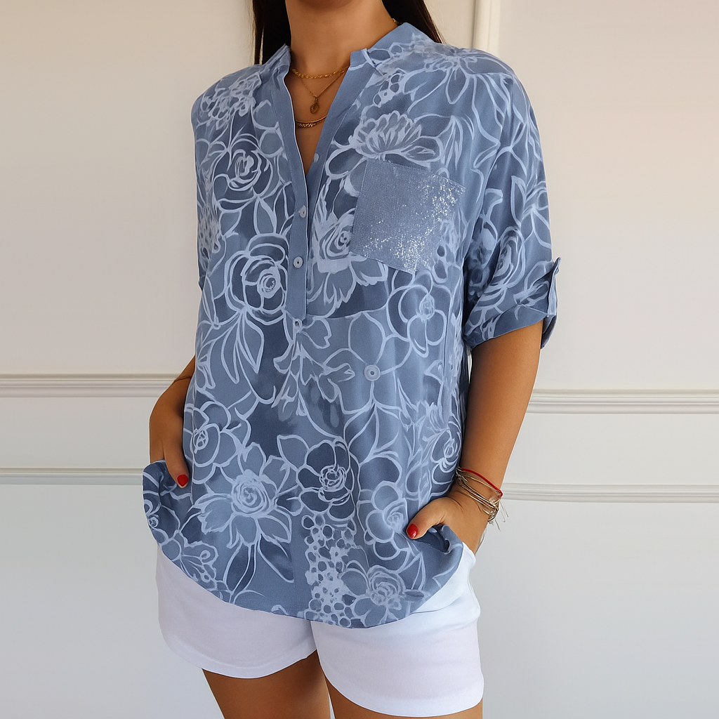 20250830_1118_BlauwBloemenpatroonBlouse_remix_01k3xrv4mkfa99j0fymb1b66dk.png